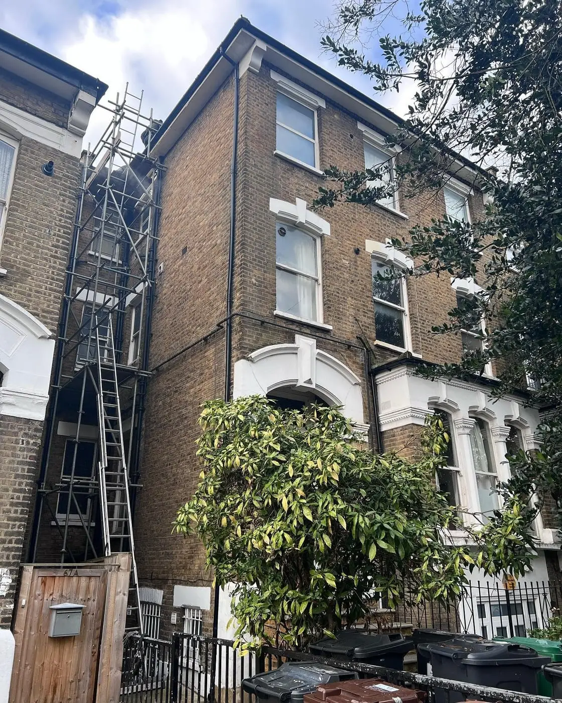 Scaffolding erected to the flank wall of a Victorian London property