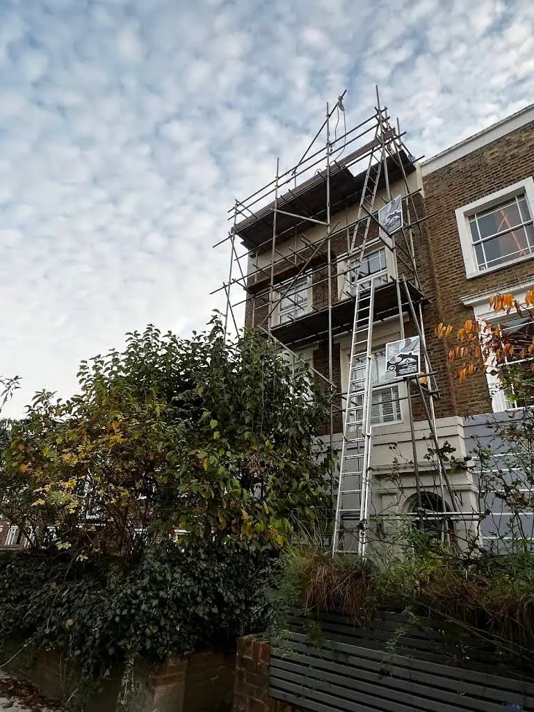 Scaffolding and ladders erected to a London property for roof works